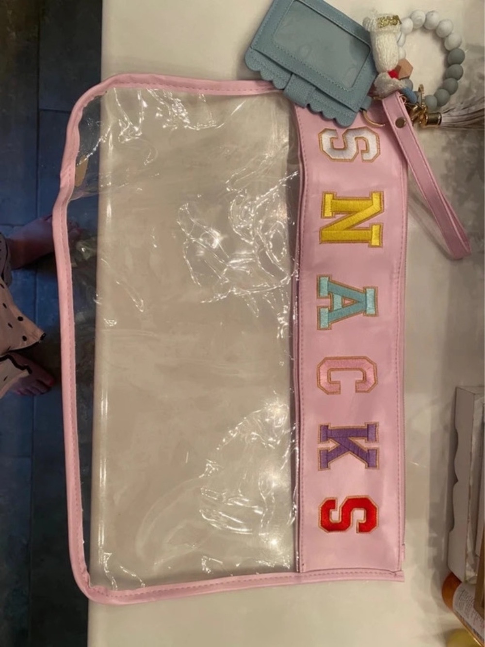 Pink Clear Wristlet Pouch with Colorful 'SNACKS' Lettering